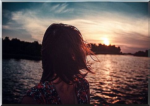 Woman by the lake