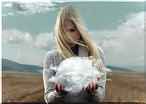 Woman holding a cloud