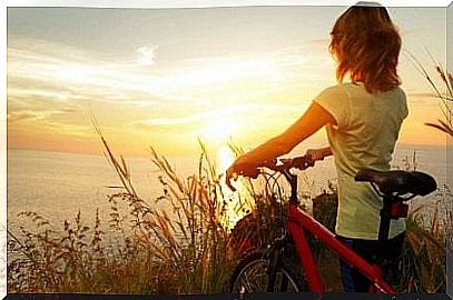 Girl with bicycle