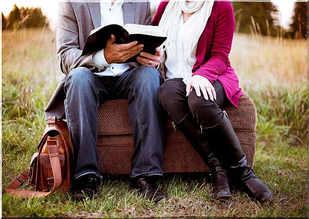 Couple with book