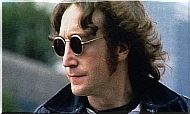 John Lennon with dark sunglasses