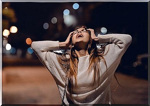 Woman screaming in the street.