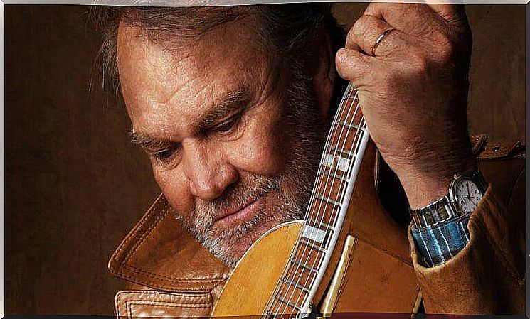 Glen Campbell with guitar.