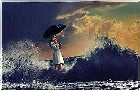 Trying to predict the future can cause a lot of anxiety, a picture of a woman on a stormy beach