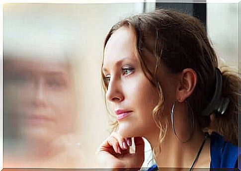 Woman looking out the window.